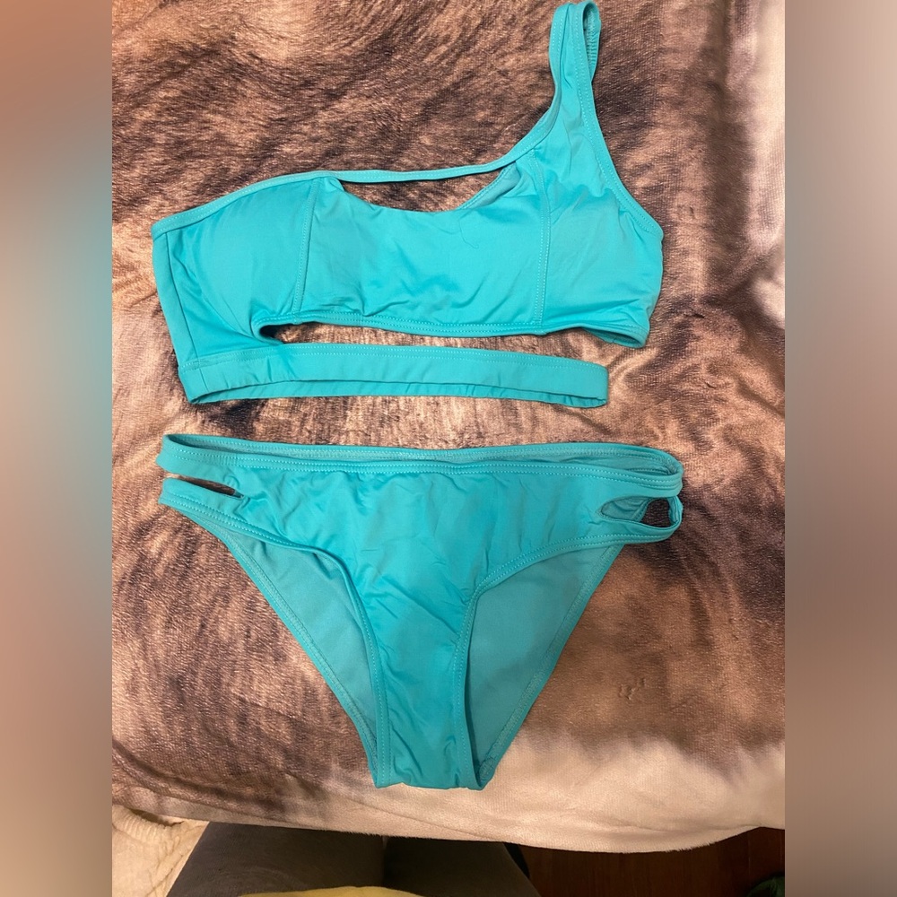 Bikini. Size small with cut out designs.